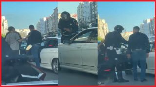 شرطي من أمن طنجة يشهر سلاحه أحد مستعملي الطريق، والذي يشتبه في تورطه في عدم الامتثال.